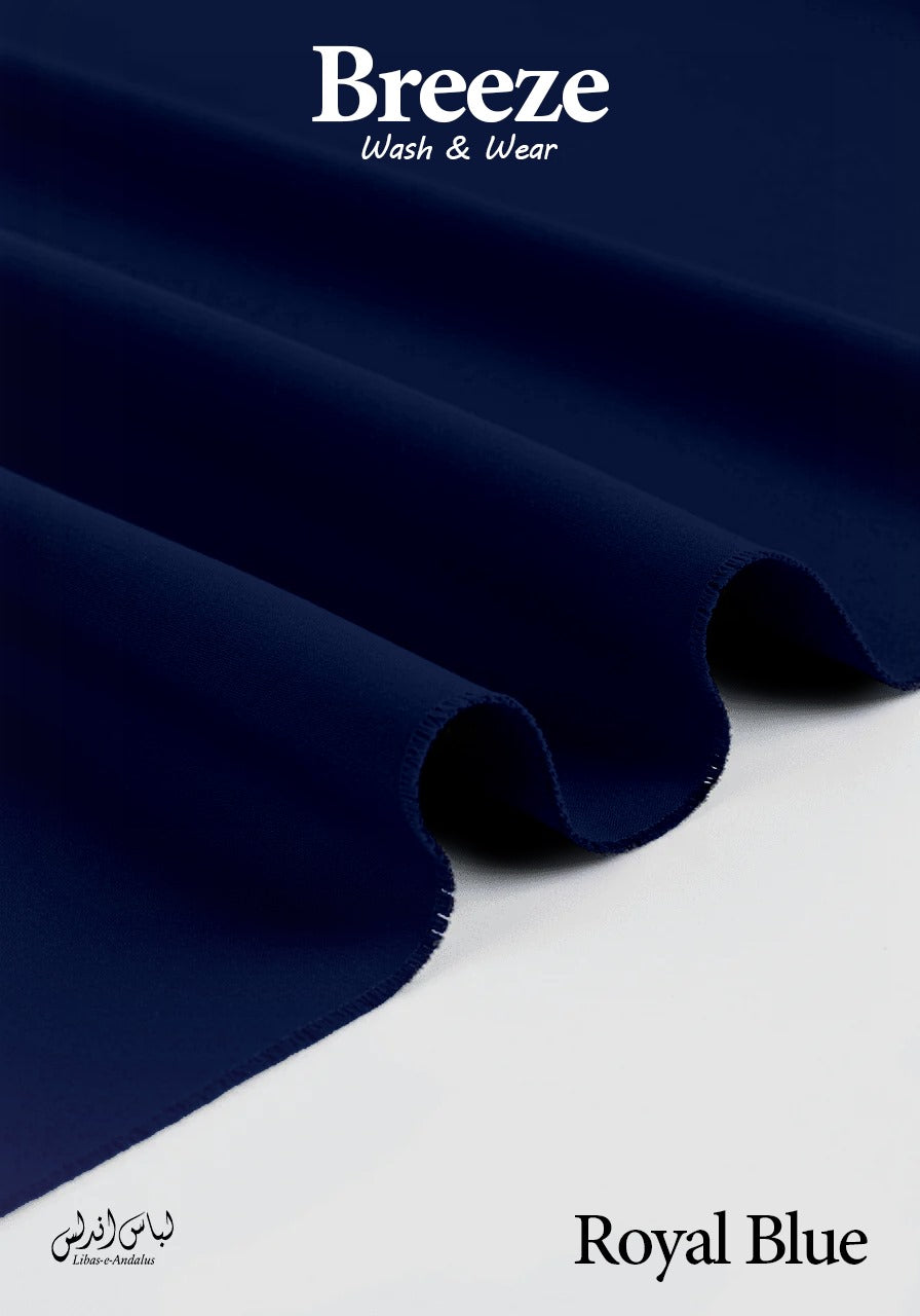 Roll of royal blue fabric with 'Breeze Wash & Wear' branding on a white background