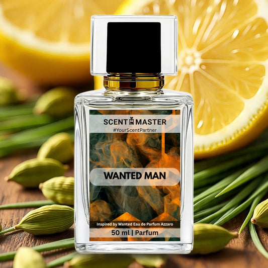 Perfume bottle labeled 'Wanted Man' by Scent Master with lemons and cardamom pods in the background.