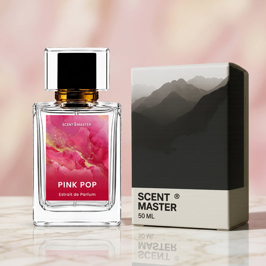 Pink Pop perfume bottle displayed next to its packaging box on a marble surface