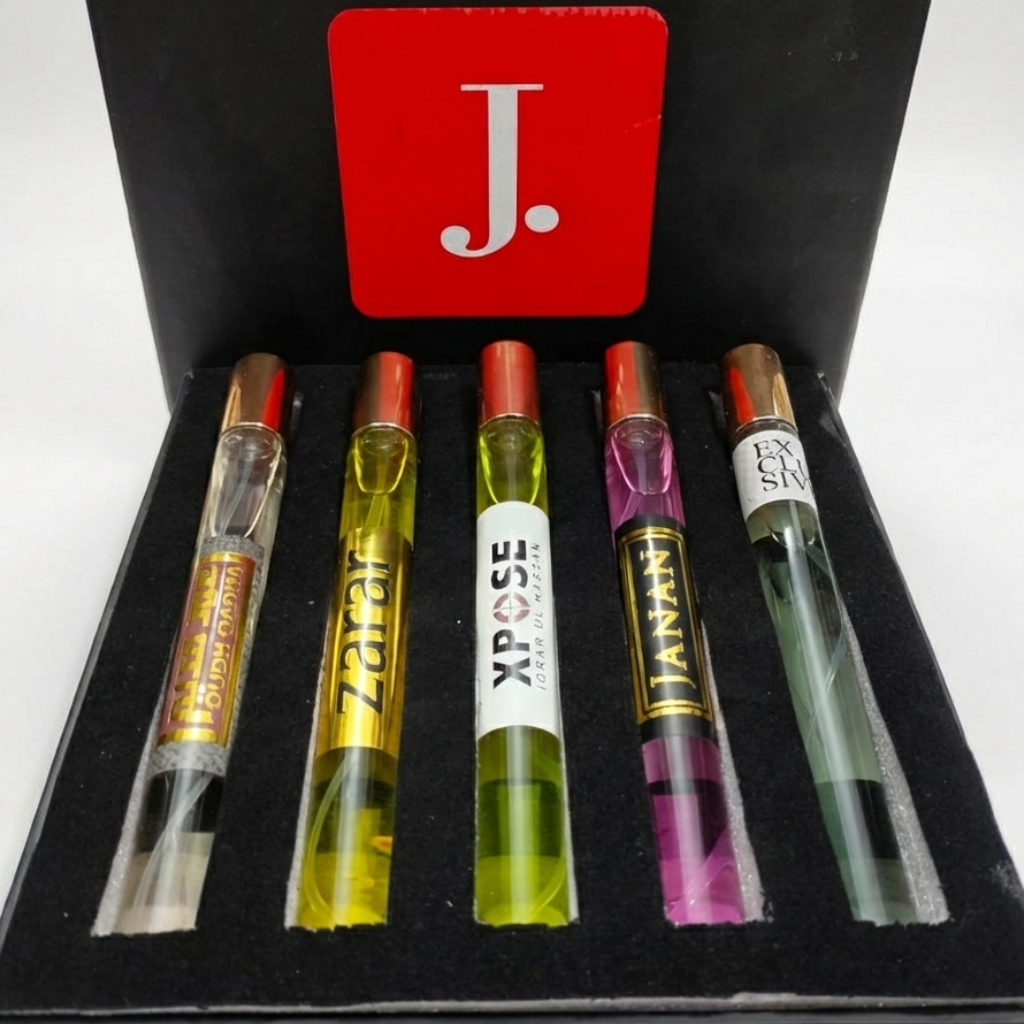 Five small glass vials with colorful liquids in a black box with a red 'J' logo.