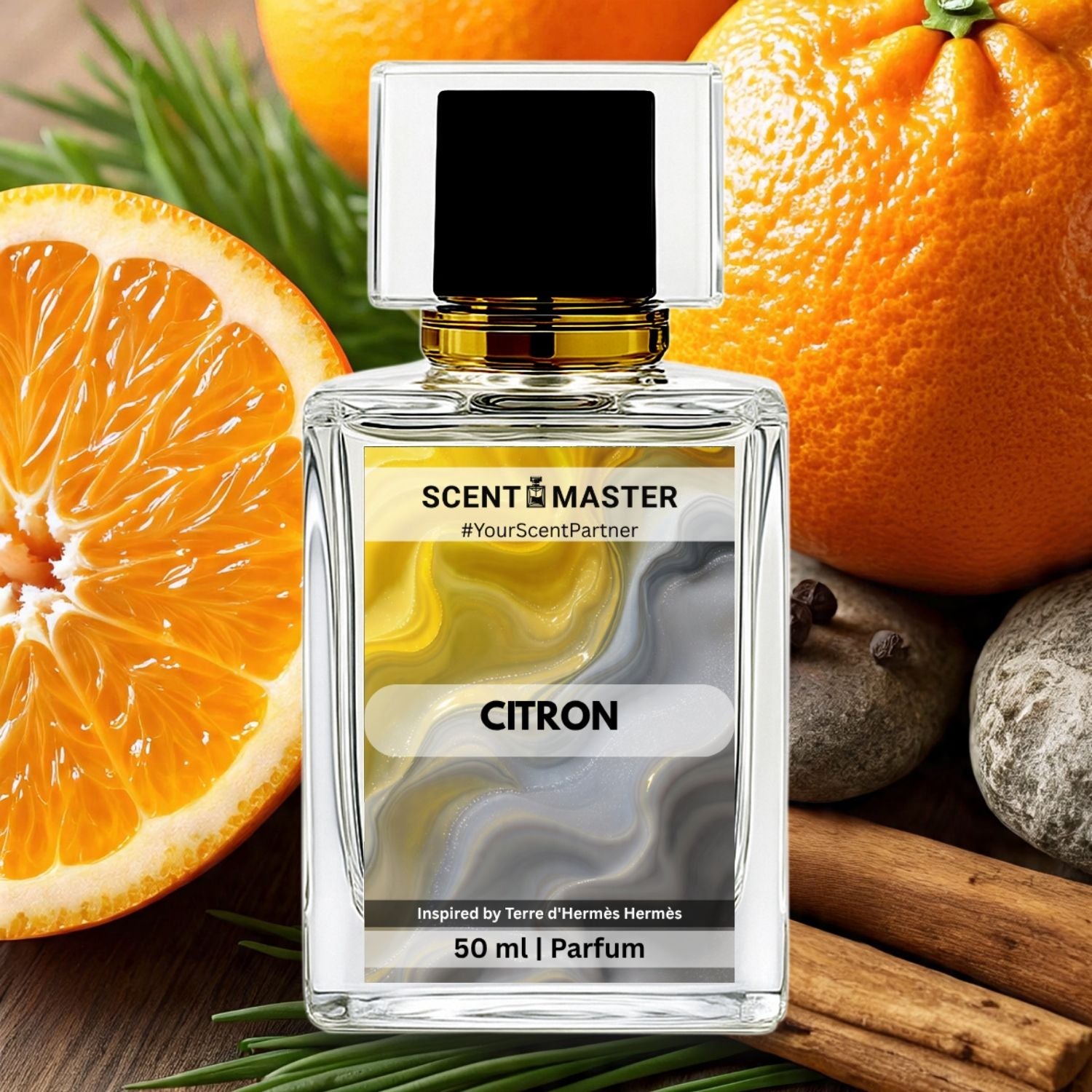 Perfume bottle labeled 'Citron' by Scent Master with oranges and cinnamon sticks in the background