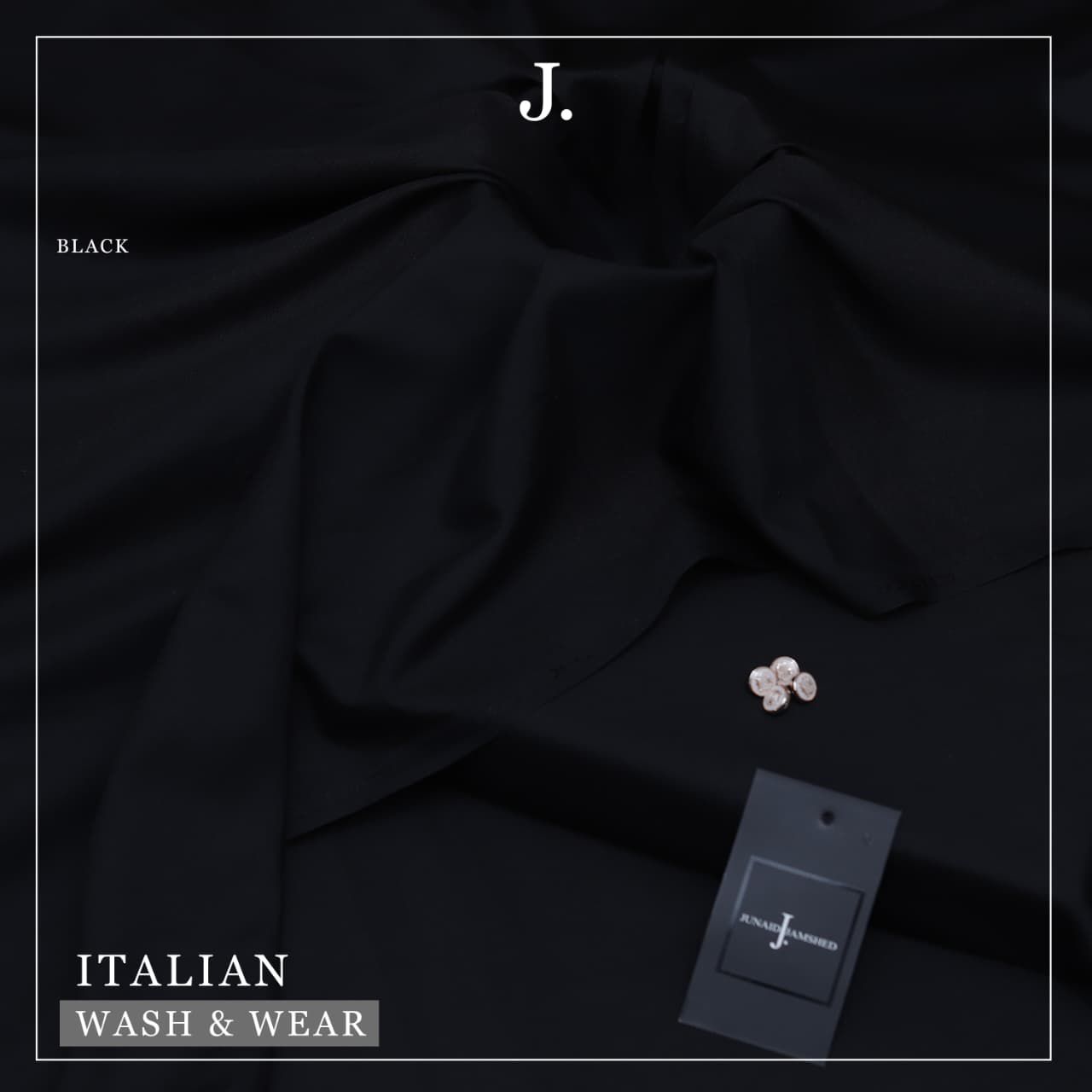 Black fabric with cufflinks and a tag on a dark background, featuring the brand 'J'.