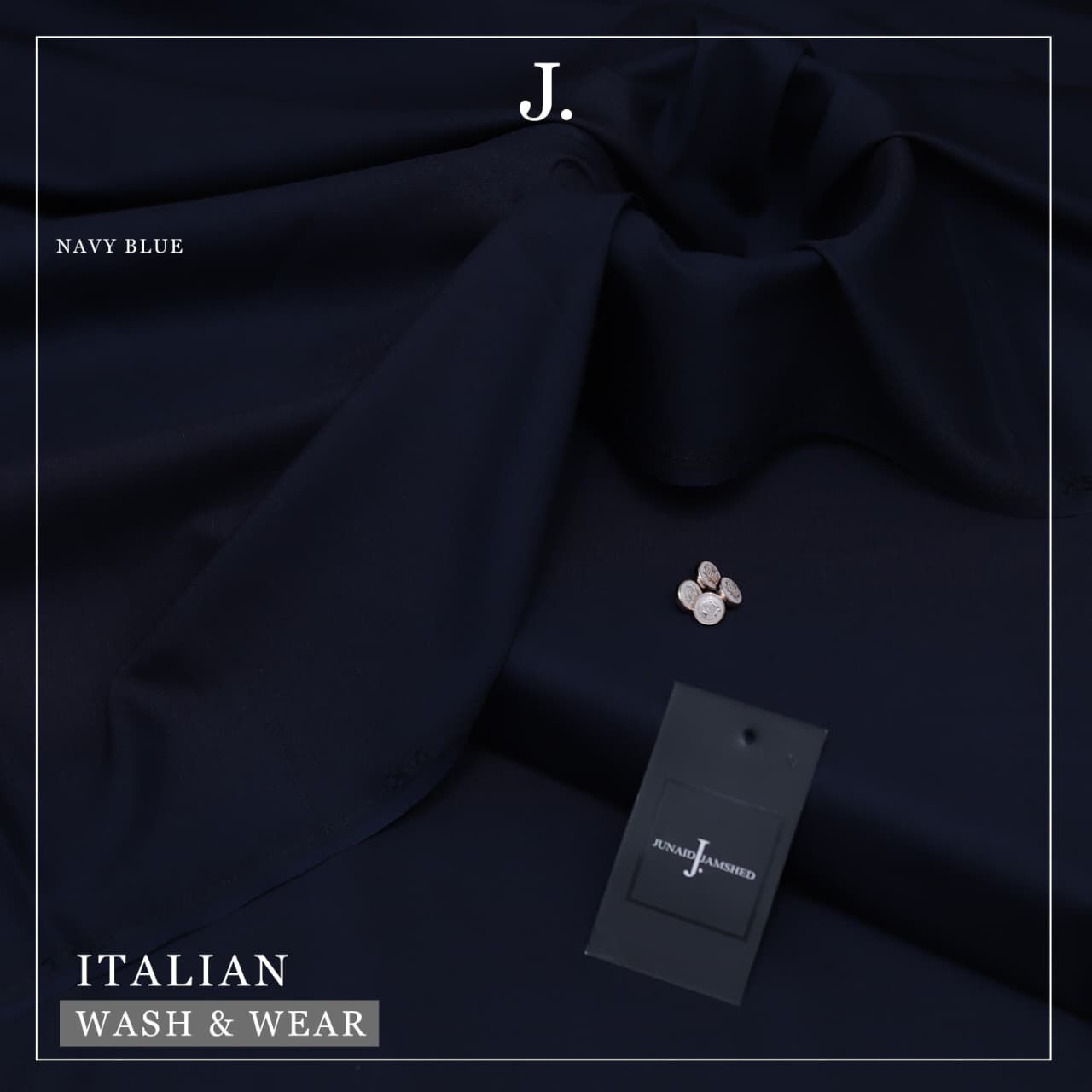Navy blue fabric with a tag and 'J' logo on a dark background