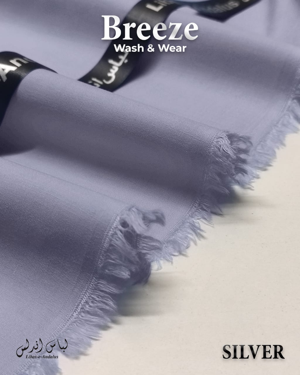 Silver fabric with 'Breeze Wash & Wear' branding on a white background