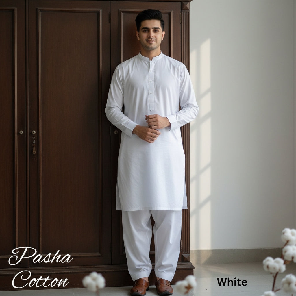 Man wearing a white kurta standing in front of a wooden wardrobe with 'Pasha Cotton' branding.