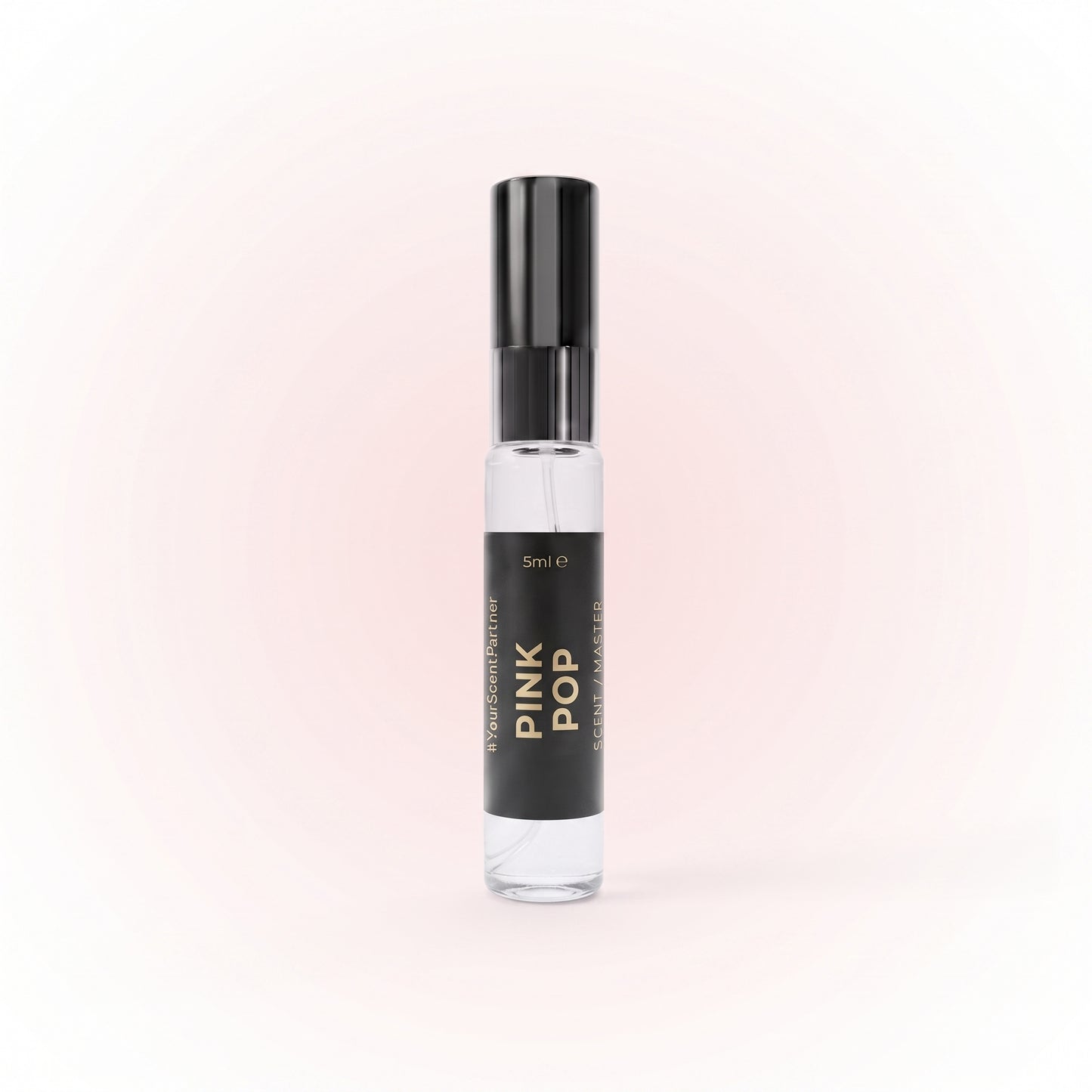 Pink Pop perfume 5ml bottle on a soft studio background
