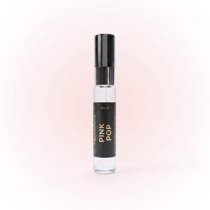 Pink Pop perfume 5ml bottle on a soft studio background