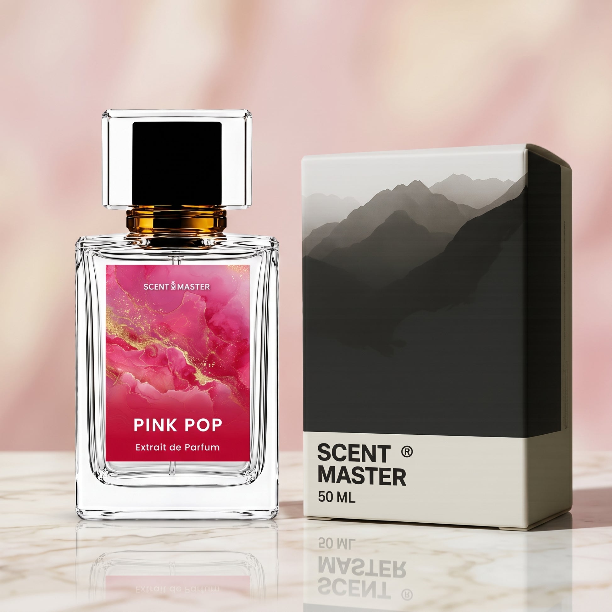 Pink Pop perfume bottle displayed next to its packaging box on a marble surface